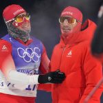 
              Jovian Hediger, of Switzerland, left, and Jonas Baumann, of Switzerland, react after the men's team sprint classic cross-country skiing competition at the 2022 Winter Olympics, Wednesday, Feb. 16, 2022, in Zhangjiakou, China. (AP Photo/Aaron Favila)
            