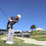 
              Xander Schauffele chips onto the second green during the third round of the Genesis Invitational golf tournament at Riviera Country Club, Saturday, Feb. 19, 2022, in the Pacific Palisades area of Los Angeles. (AP Photo/Ryan Kang)
            