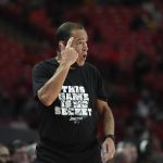 
              Houston head coach Kelvin Sampson talks to his players during the first half of an NCAA college basketball game against Tulane Wednesday, Feb. 2, 2022, in Houston. (AP Photo/Justin Rex)
            