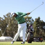 
              Hideki Matsuyama, of Japan, hits his second shot on the ninth hole during the Genesis Invitational pro-am golf event at Riviera Country Club, Wednesday, Feb. 16, 2022, in the Pacific Palisades area of Los Angeles. (AP Photo/Ryan Kang)
            