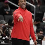 
              Washington Wizards head coach Wes Unseld Jr. gestures during the first half of an NBA basketball game against the San Antonio Spurs, Friday, Feb. 25, 2022, in Washington. (AP Photo/Luis M. Alvarez)
            