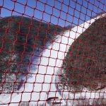 
              The alpine skiing downhill course can be seen through safety fencing at the 2022 Winter Olympics, Wednesday, Feb. 2, 2022, in the Yanqing district of Beijing. (AP Photo/Robert F. Bukaty)
            