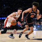 
              Miami Heat guard Tyler Herro (14) drives against New York Knicks forward Jericho Sims (45) during the first half an NBA basketball game Friday, Feb. 25, 2022, in New York. (AP Photo/Jessie Alcheh)
            