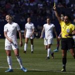 
              New Zealand defender CJ Bott, left, receives a yellow card during the first half of the 2022 SheBelieves Cup soccer match against the United States Sunday, Feb. 20, 2022, in Carson, Calif. (AP Photo/Mark J. Terrill)
            