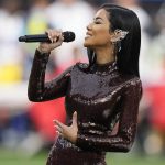 
              Jhené Aiko performs "America the Beautiful" before the NFL Super Bowl 56 football game between the Los Angeles Rams and the Cincinnati Bengals Sunday, Feb. 13, 2022, in Inglewood, Calif. (AP Photo/Lynne Sladky)
            