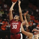
              Stanford's Haley Jones (30) drives to the basket as Oregon State's Taya Corosdale (5) defends during the second half of an NCAA college basketball game in Corvallis, Ore., Friday, Feb. 18, 2022. Stanford won 87-63. (AP Photo/Amanda Loman)
            
