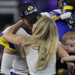 
              Los Angeles Rams quarterback Matthew Stafford kisses his wife Kelly Hall after the NFL Super Bowl 56 football game against the Cincinnati Bengals, Sunday, Feb. 13, 2022, in Inglewood, Calif. The Los Angeles Rams won 23-20. (AP Photo/Tony Gutierrez)
            