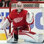 
              Detroit Red Wings goaltender Alex Nedeljkovic (39) keeps his eyes on the puck in the second period of an NHL hockey game against the Los Angeles Kings Wednesday, Feb. 2, 2022, in Detroit. (AP Photo/Paul Sancya)
            