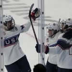 
              United States' Hilary Knight, right, celebrates a goal with teammates United States' Lee Stecklein, left, and United States' Hannah Brandt during the women's gold medal hockey game against Canada at the 2022 Winter Olympics, Thursday, Feb. 17, 2022, in Beijing. (AP Photo/Jae C. Hong)
            