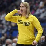 
              Marquette coach Megan Duffy shouts to players during the first half of the team's NCAA college basketball game against Connecticut, Wednesday, Feb. 23, 2022, in Hartford, Conn. (AP Photo/Jessica Hill)
            