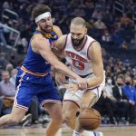 
              New York Knicks guard Evan Fournier, right, is defended by Golden State Warriors guard Klay Thompson during the first half of an NBA basketball game in San Francisco, Thursday, Feb. 10, 2022. (AP Photo/Jeff Chiu)
            
