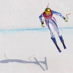 
              Romane Miradoli of France makes a jump during the women's combined downhill at the 2022 Winter Olympics, Thursday, Feb. 17, 2022, in the Yanqing district of Beijing. (AP Photo/Luca Bruno)
            