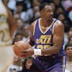 
              FILE - Utahs Karl Malone handles the ball during NBA Western Conference semifinal game against the SuperSonics, May 11, 1992, Seattle, Wash. (AP Photo/Gary Stewart, File)
            