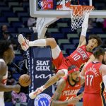 
              New Orleans Pelicans center Jaxson Hayes (10) dunks against the Toronto Raptors during the first half of an NBA basketball game in New Orleans, Monday, Feb. 14, 2022. (AP Photo/Matthew Hinton)
            