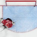 
              A shot by Switzerland bounces off the goal post behind Russian Olympic Committee goalkeeper Maria Sorokina during a preliminary round women's hockey game at the 2022 Winter Olympics, Friday, Feb. 4, 2022, in Beijing. (AP Photo/Matt Slocum)
            