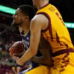 
              Kansas State forward Davion Bradford is fouled by Iowa State forward Aljaz Kunc, right, during the second half of an NCAA college basketball game, Saturday, Feb. 12, 2022, in Ames, Iowa. (AP Photo/Charlie Neibergall)
            