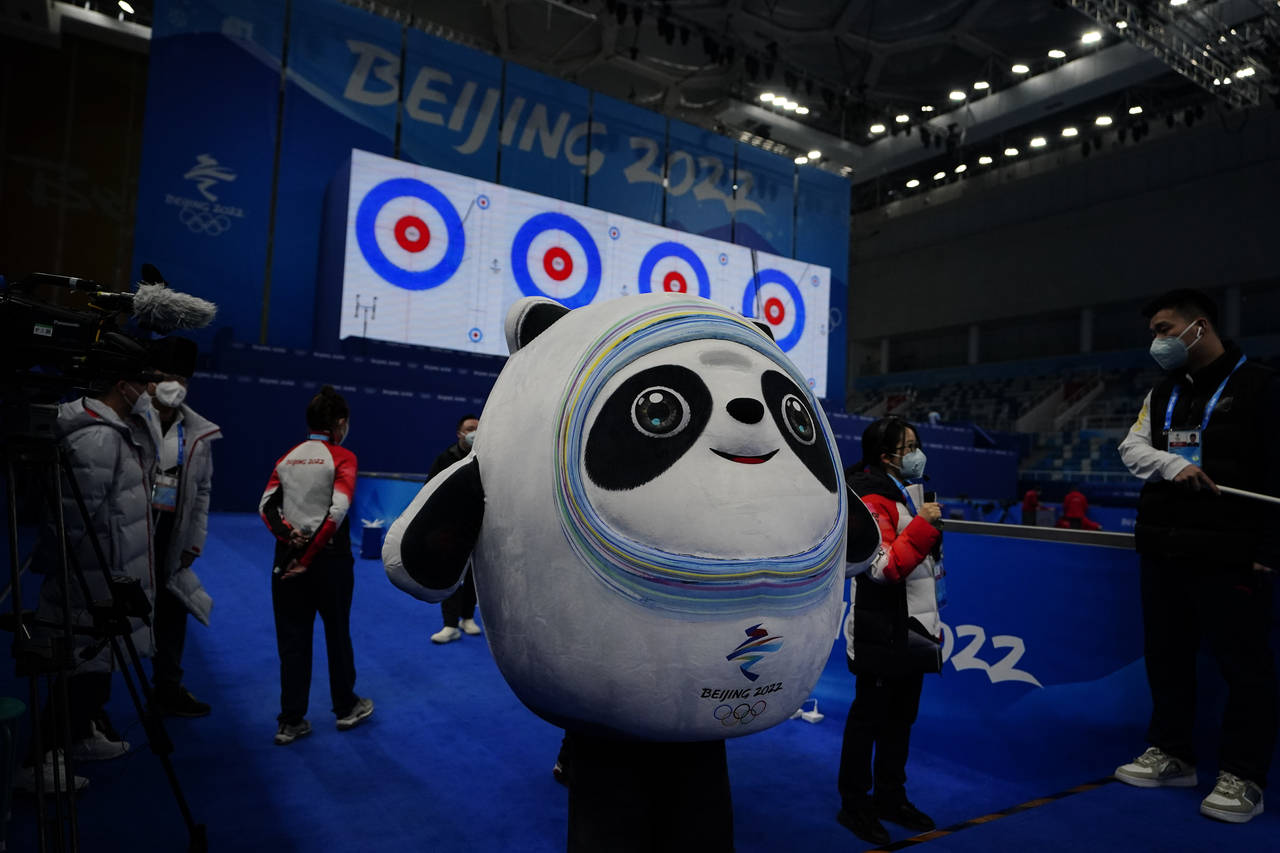 Bing Dwen Dwen, the Beijing Winter Olympics mascot practices at the Curling venue ahead of the Beij...