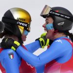 
              Nadia Delago, left, and Nicol Delago, of Italy, embrace after finishing the women's downhill at the 2022 Winter Olympics, Tuesday, Feb. 15, 2022, in the Yanqing district of Beijing. (AP Photo/Dmitri Lovetsky)
            