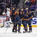 
              Edmonton Oilers players celebrate a goal against the New York Islanders during the first period of an NHL hockey game Friday, Feb. 11, 2022, in Edmonton, Alberta. (Jason Franson/The Canadian Press via AP)
            