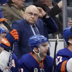 
              New York Islanders coach Barry Trotz watches during the first period of the team's NHL hockey game against the Boston Bruins, Thursday Feb. 17, 2022, in Elmont, N.Y. (AP Photo/Corey Sipkin).
            