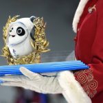 
              A mascot that is presented to the medal winners is displayed during the venue ceremony for the women's moguls at Genting Snow Park at the 2022 Winter Olympics, Sunday, Feb. 6, 2022, in Zhangjiakou, China. (AP Photo/Francisco Seco)
            