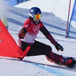 
              Switzerland's Patrizia Kummer competes during the women's parallel giant slalom elimination run at the 2022 Winter Olympics, Tuesday, Feb. 8, 2022, in Zhangjiakou, China. (AP Photo/Lee Jin-man)
            