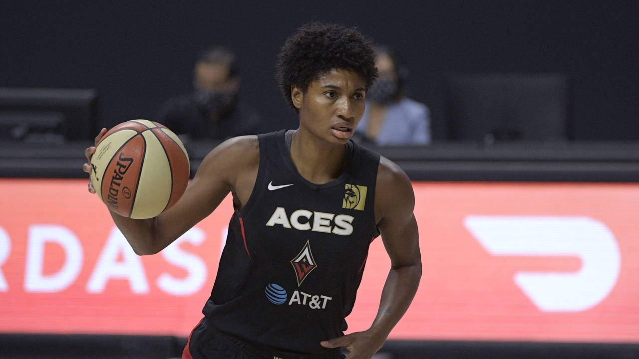 FILE - Las Vegas Aces forward Angel McCoughtry (35) sets up a play during the first half of Game 2 ...