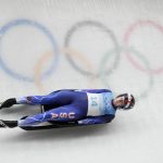 
              Emily Sweeney, of the United States, slides during the luge women's singles run 3 at the 2022 Winter Olympics, Tuesday, Feb. 8, 2022, in the Yanqing district of Beijing. (AP Photo/Dmitri Lovetsky)
            