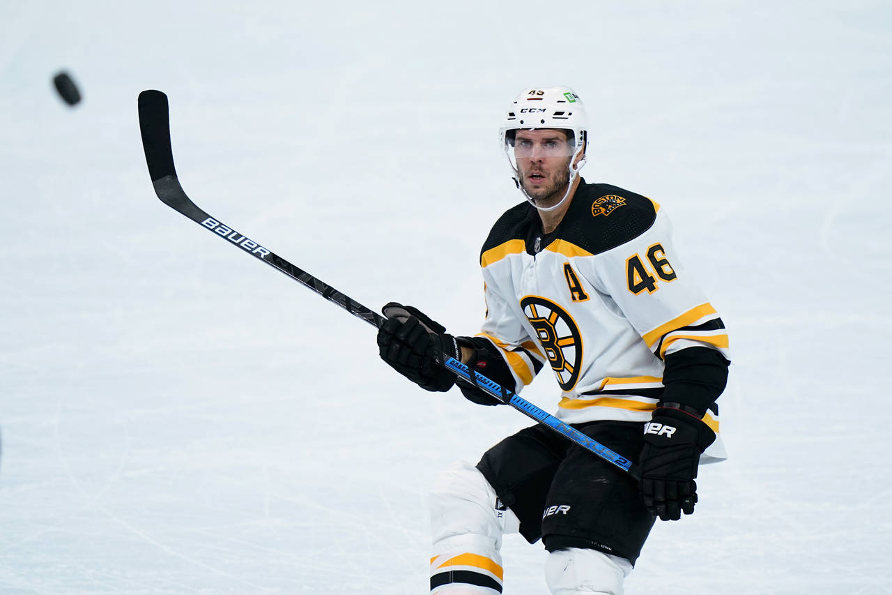 FILE- Boston Bruins' David Krejci plays during an NHL hockey game against the Philadelphia Flyers, ...