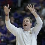 
              LSU coach Will Wade signals during the first half of the team's NCAA college basketball game against Mississippi in Baton Rouge, La., Tuesday, Feb. 1, 2022. (AP Photo/Matthew Hinton)
            