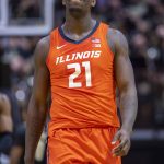 
              Illinois center Kofi Cockburn (21) reacts after missing a dunk during the second half of an NCAA college basketball game against Purdue, Tuesday, Feb. 8, 2022, in West Lafayette, Ind. (AP Photo/Doug McSchooler)
            