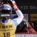 
              Switzerland's Priska Nufer smiles at teammate Michelle Gisin after she completed an alpine ski, women's World Cup downhill race, in Crans Montana, Switzerland, Sunday, Feb. 27, 2022. (AP Photo/Giovanni Auletta)
            