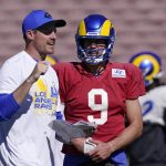 
              Los Angeles Rams offensive coordinator Kevin O'Connell, left, talks with quarterback Matthew Stafford during practice for an NFL Super Bowl football game Thursday, Feb. 10, 2022, in Pasadena, Calif. The Rams are scheduled to play the Cincinnati Bengals in the Super Bowl on Sunday. (AP Photo/Mark J. Terrill)
            