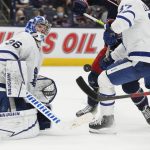 
              Toronto Maple Leafs' Jack Campbell, left, makes a save against the Columbus Blue Jackets during the second period of an NHL hockey game Tuesday, Feb. 22, 2022, in Columbus, Ohio. (AP Photo/Jay LaPrete)
            