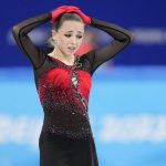 
              Kamila Valieva, 15, of the Russian Olympic Committee, reacts after the women's team free skate program during the figure skating competition at the 2022 Winter Olympics, Monday, Feb. 7, 2022, in Beijing. The 2022 Games' first major scandal has managed to involve the 15-year-old figure skater who has tested positive for using a banned heart medication that may cost her Russia-but-not-really-Russia team a gold medal in team competition. Kamila Valieva continues to train even as her final disposition is considered, and she may yet compete in the women's individual competition, in which she is favored. (AP Photo/Natacha Pisarenko)
            