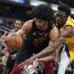 
              Cleveland Cavaliers' Jarrett Allen (31) grabs a rebound next to Indiana Pacers' Jalen Smith during the second half of an NBA basketball game Friday, Feb. 11, 2022, in Indianapolis. The Cavaliers won 120-113. (AP Photo/Darron Cummings)
            