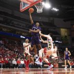 
              Northwestern's Chase Audige (1) shoots over Nebraska's Bryce McGowens (5) and Keisei Tominaga (30) during the second half of an NCAA college basketball game Saturday, Feb. 5, 2022, in Lincoln, Neb. Audige scored 16 points during Northwestern's 87-63 victory over Nebraska. (AP Photo/Rebecca S. Gratz)
            