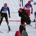 
              Victoria Carl, of Germany, left, celebrates a gold medal finish ahead of Natalia Nepryaeva, of the Russian Olympic Committee, center, and Jonna Sundling, of Sweden, right during the women's team sprint classic cross-country skiing competition at the 2022 Winter Olympics, Wednesday, Feb. 16, 2022, in Zhangjiakou, China. (AP Photo/Alessandra Tarantino)
            