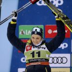 
              FILE - Second placed Sweden's Stina Nilsson celebrates on the podium after the cross-country ski, women's World Cup sprint event, in Planica, Slovenia, Dec. 21, 2019. Nilsson was at the top of her game after winning four medals at the 2018 Winter Olympics and two World Championship titles in 2019. But Nilsson shocked the Nordic community when she announced in 2020 that she was leaving one of the strongest cross country teams in the world to try her hand at biathlon. (AP Photo/Darko Bandic, File)
            