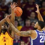 
              Iowa State guard Izaiah Brockington fights for a rebound with Kansas State forward Davion Bradford (21) during the first half of an NCAA college basketball game, Saturday, Feb. 12, 2022, in Ames, Iowa. (AP Photo/Charlie Neibergall)
            