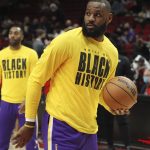 
              Los Angeles Lakers forward LeBron James warms up prior to an NBA basketball game against the Portland Trail Blazers in Portland, Ore., Wednesday, Feb. 9, 2022. (AP Photo/Steve Dipaola)
            