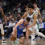 
              Oklahoma City Thunder's Mamadi Diakite (25) looks on as guard Ty Jerome (16) keeps control of the ball under pressure from Dallas Mavericks forward George King (8) in the first half of a NBA basketball game in Dallas, Wednesday, Feb. 2, 2022. (AP Photo/Tony Gutierrez)
            