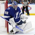 
              Tampa Bay Lightning goaltender Andrei Vasilevskiy (88) makes a save on a shot by the Edmonton Oilers during the first period of an NHL hockey game Wednesday, Feb. 23, 2022, in Tampa, Fla. (AP Photo/Chris O'Meara)
            