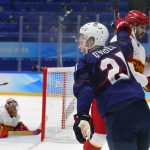 
              United States' Brian Oneill (21) celebrates after scoring a goal against China goalkeeper Jieruimi Shimisi (Jeremy Smith) (45) during a preliminary round men's hockey game at the 2022 Winter Olympics, Thursday, Feb. 10, 2022, in Beijing. (AP Photo/Matt Slocum)
            