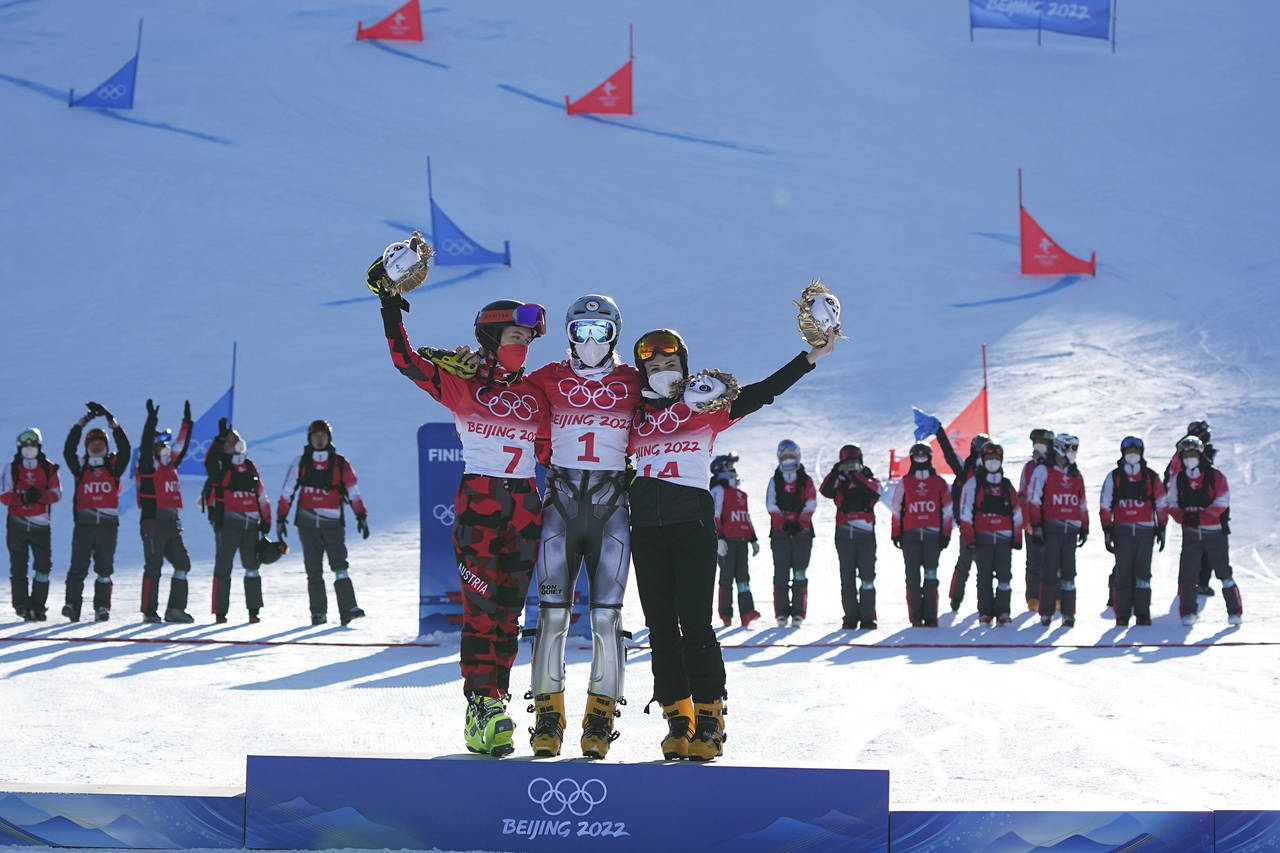 From left, silver medalist Austria's Daniela Ulbing, gold medalist Czech Republic's Ester Ledecka a...