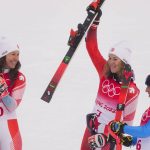 
              From left, Wendy Holdener, of Switzerland, Michelle Gisin, of Switzerland, and Federica Brignone, of Italy, celebrates after the women's combined slalom at the 2022 Winter Olympics, Thursday, Feb. 17, 2022, in the Yanqing district of Beijing. (AP Photo/Mark Schiefelbein)
            