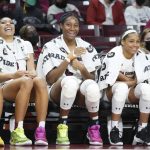 
              South Carolina forward Aliyah Boston, center, laughs with Destiny Littleton, left, Victaria Saxton, second from left, Zia Cooke, second from right, and Destanni Henderson, right, during the second half of the team's NCAA college basketball game against Alabama on Thursday, Feb. 3, 2022, in Columbia, S.C. South Carolina won 83-51. (AP Photo/Sean Rayford)
            