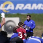 
              Los Angeles Rams head coach Sean McVay watches as his team stretches during practice for an NFL Super Bowl football game Friday, Feb. 11, 2022, in Thousand Oaks, Calif. The Rams are scheduled to play the Cincinnati Bengals in the Super Bowl on Sunday. (AP Photo/Mark J. Terrill)
            