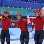 
              Team Norway's Peder Kongshaug, left, Sverre Lunde Pedersen, center, and Hallgeir Engebraaten celebrate after they won the gold medal in the speedskating men's team pursuit finals at the 2022 Winter Olympics, Tuesday, Feb. 15, 2022, in Beijing. (AP Photo/Sue Ogrocki)
            