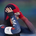 
              Ellia Smeding of Britain readies to compete in the women's speedskating 1,500-meter race at the 2022 Winter Olympics, Monday, Feb. 7, 2022, in Beijing. (AP Photo/Sue Ogrocki)
            